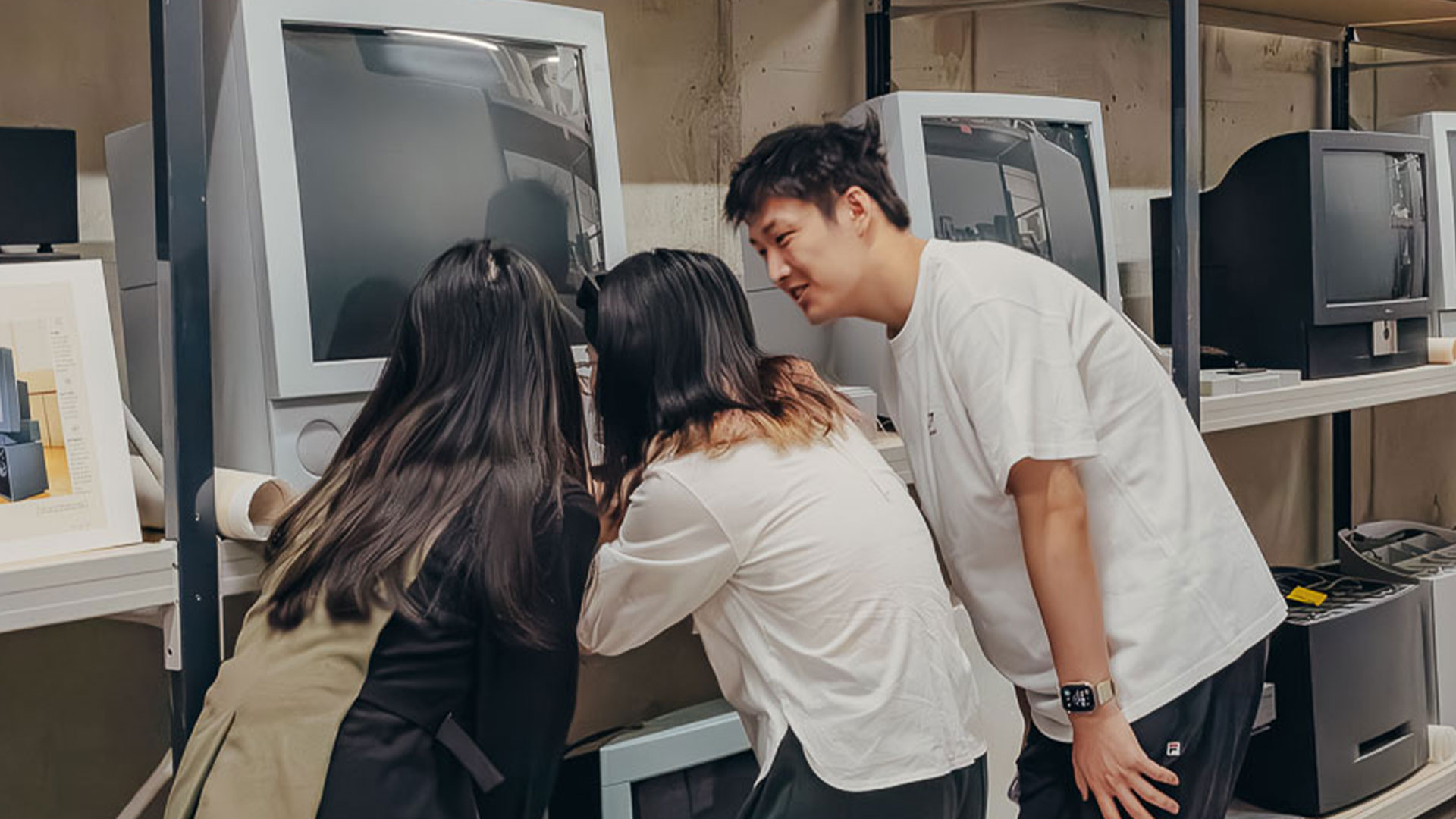 Studentes checking out the loewe television from the PHOENIX archives