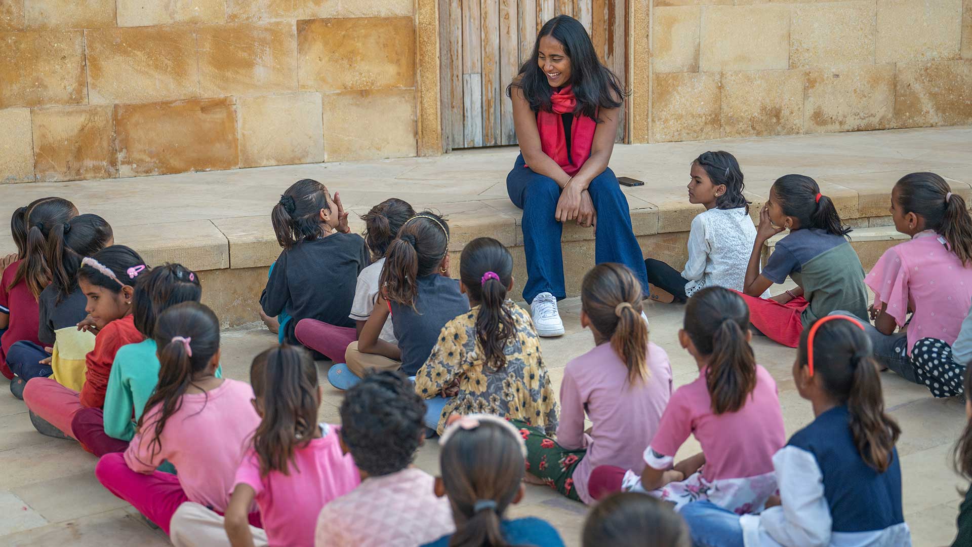 Adidi, designer at PHOENIX Design agency ministring the workshop with the girls on the Rajkumari Ratnavati Girls School