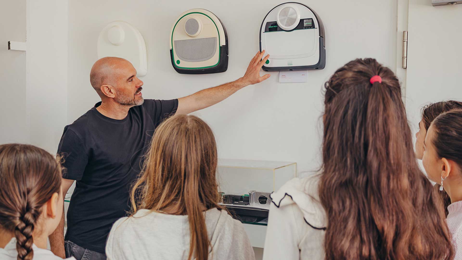 Marc Michelak showing the model shop to the girls on the PHOENIX design studio in germany