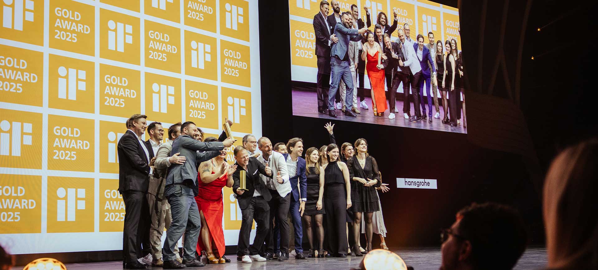 cerimony if Design award 2025 where phoenix desing has won 15 awards and 3 gold nominations, stage picture with the Hansgrohe team