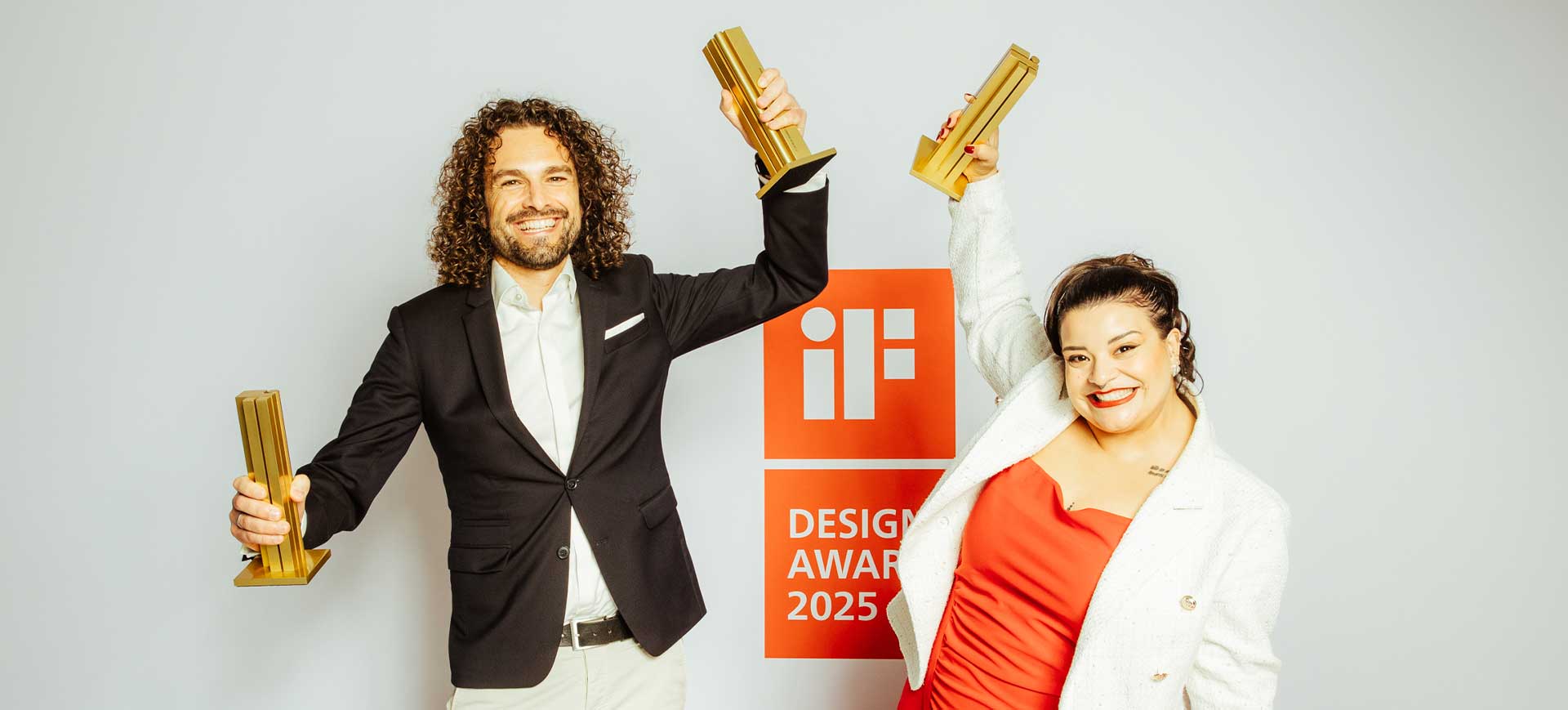 Mathias Oesterle and Barbara Silva, PHOENIX employeesm received the 3 if gold awards, and take pictures on the photobooth of the if design award cerimony