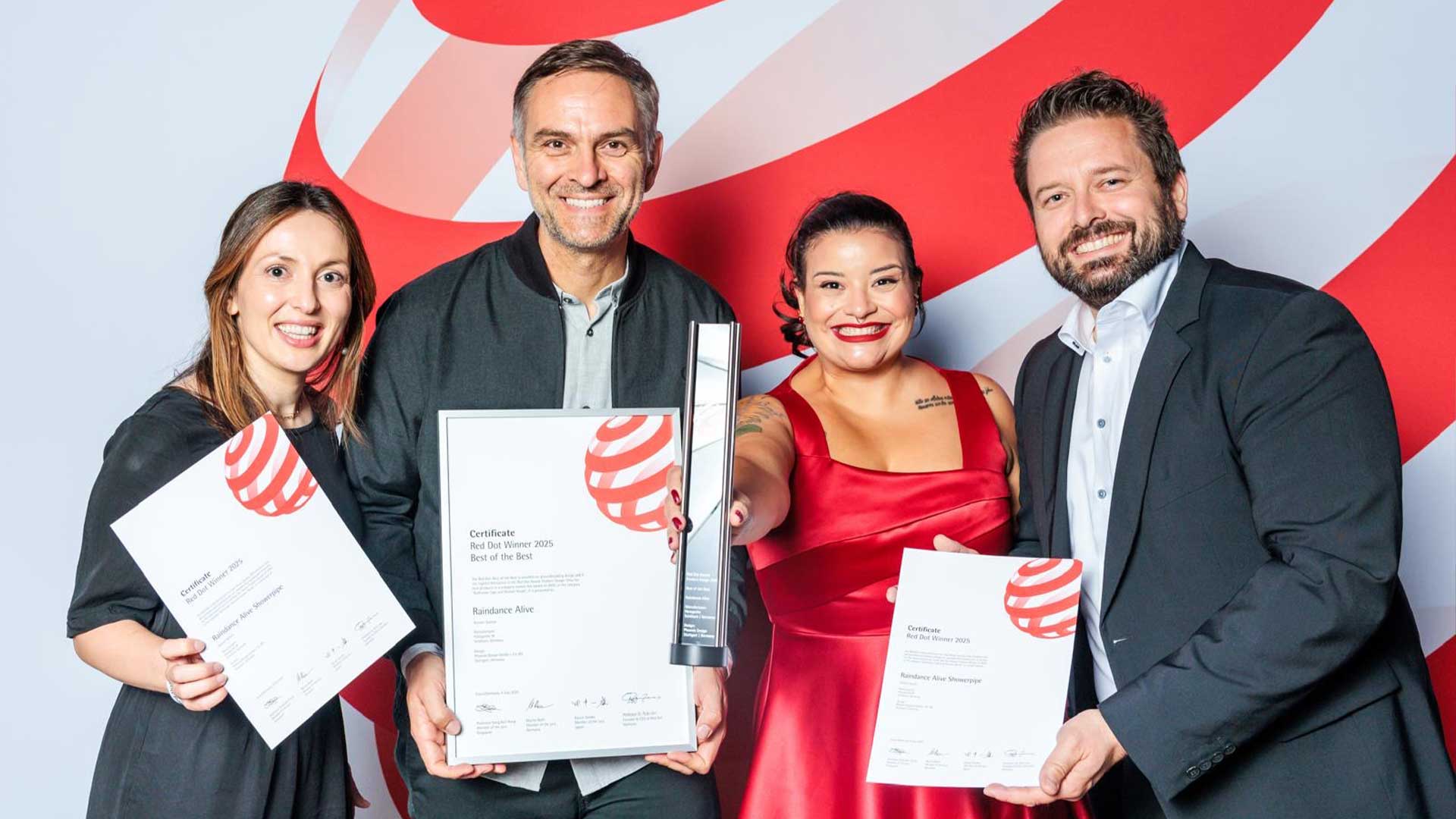 teams from PHOENIX design and Hansgrohe receiving they award from RED DOT AWARD best of the best 2025