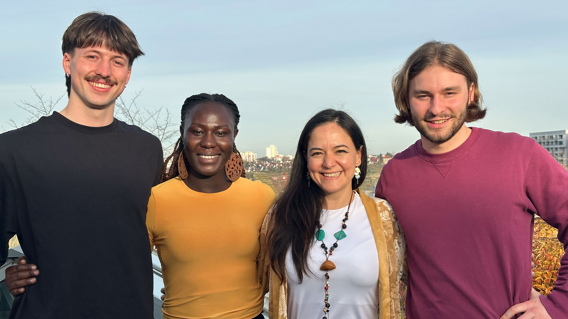 Lennard blatt, Elias Grieninger, Mary Apolot and Jessica Trejo - sustainable african shower team together.